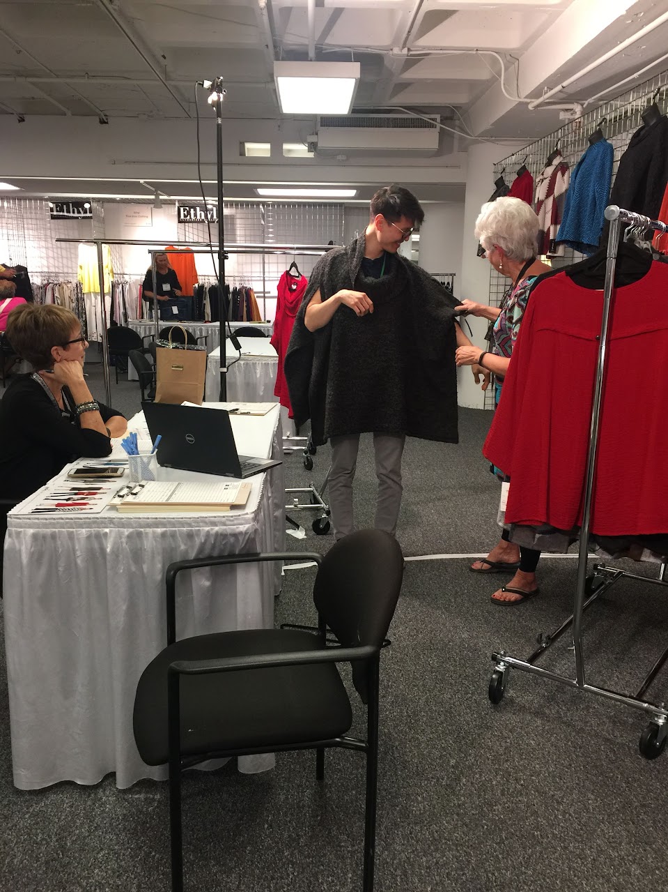 Noa in Atlanta apparel show assisting boutique owners